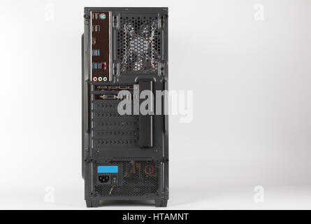 Back side of midi tower computer case on white background Stock Photo