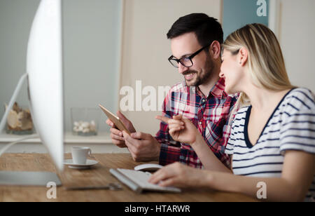Couple in love shopping and buying goods from internet Stock Photo