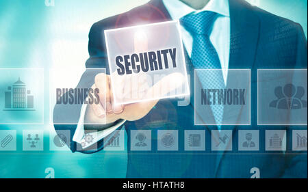 Businessman pressing an Security concept button. Stock Photo