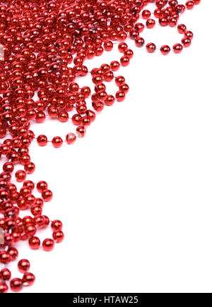 Christmas decorative red bead garland isolated on a white background. Stock Photo