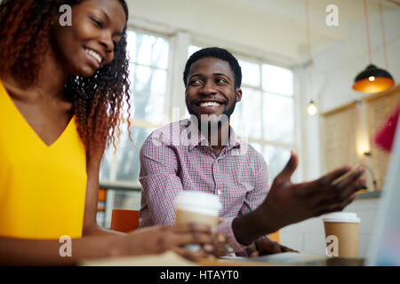 Analysts discussing financial project at meeting Stock Photo