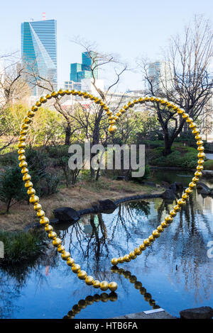 Kin no Kokoro (Golden Heart) sculpture by Jean-Michel Othoniel located in Mori Garden, Roppongi Hills, Minato, Tokyo. Stock Photo