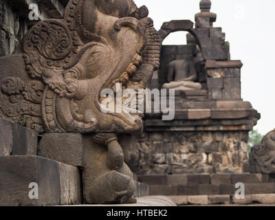 A detail of a carved relief at Borobudur Temple in Indonesia. Stock Photo