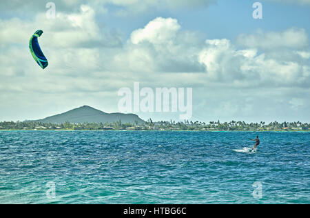 Kailua, Hawaii, USA - August 1, 2016: Unidentified man kiteboarding in Kailua Bay off KMCAS Hawaii Stock Photo