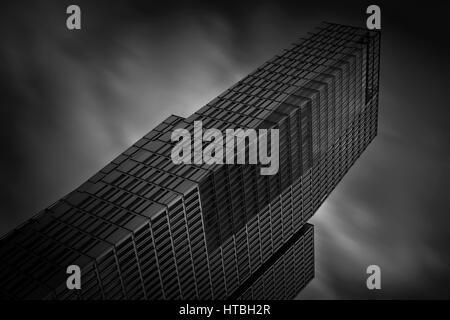 Black and white capture of the Nextower building in Frankfurt am Main, Germany Stock Photo