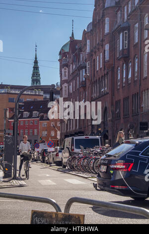 COPENHAGEN, DENMARK - SEPTEMBER 5: Cyclists waiting for green light in central Copenhagen Denmark Europe on September 5, 2016 in Copenhagen, Denmark. Stock Photo