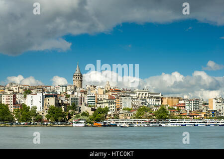 Galata Tower (Galata Kulesi) And Istanbul Skyline on a sunny day, Turkey Stock Photo