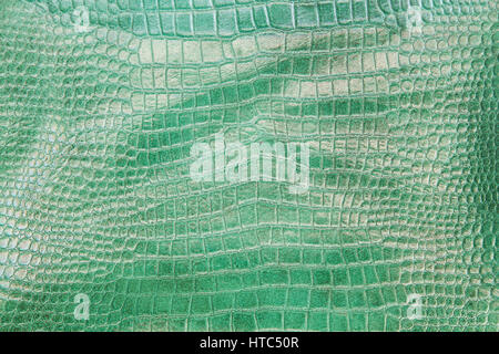 Crocodile green leather texture background. Stock Photo