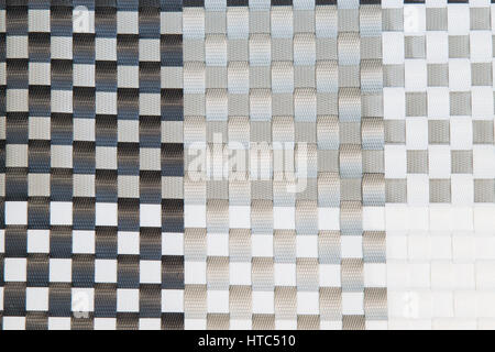 Woven plastic background in black and white. Stock Photo