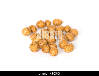 Roasted peanuts coated isolated on white background. Stock Photo