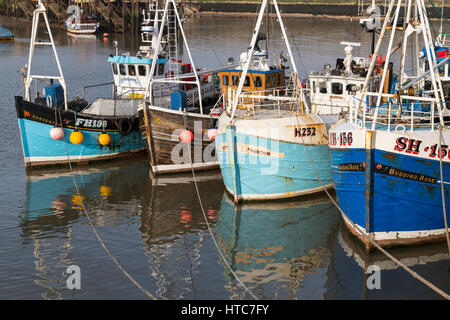 Fishing Boats moored in Bridlington Harbour North Yorkshire Coast UK Stock Photo