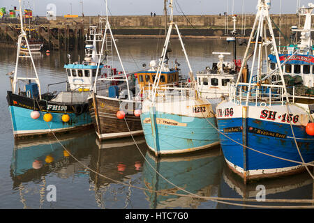 Fishing Boats moored in Bridlington Harbour North Yorkshire Coast UK Stock Photo