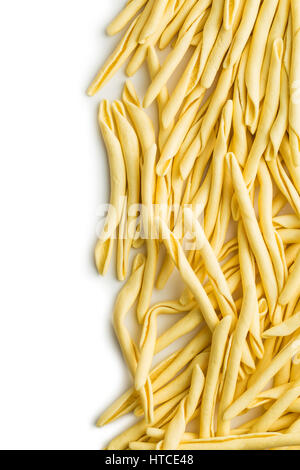 Raw italian pasta isolated on white background. Stock Photo