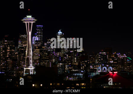 SEATTLE, WASHINGTON, USA - JAN 23rd, 2017: Night Cityscape of Seattle Skyline with Dark Sky Background for Building Lights, panorama seen from Kerry Park, Space Needle in focus Stock Photo