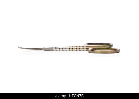 Beautiful metal manicure scissors, side view, isolated on white background Stock Photo