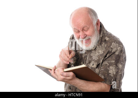 Handsome bald and bearded senior man in yeyeglasses laughing while reading a book, isolated on white background Stock Photo