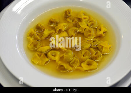 Capelletti tortellini in broth - traditional Italian food Stock Photo