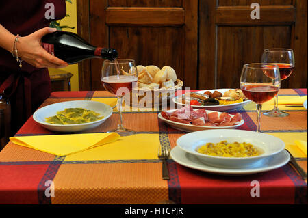 Italian food on italian restaurant table Stock Photo