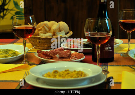 Italian food on italian restaurant table Stock Photo