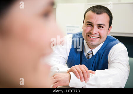 Smiling office workers Stock Photo