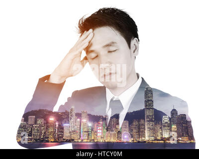Double exposure of  business man having stress against the city isolated on white background Stock Photo