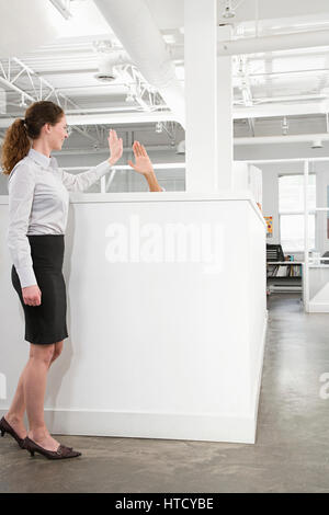 Colleagues doing high five Stock Photo