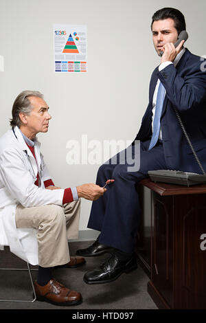 Businessman having a medical Stock Photo