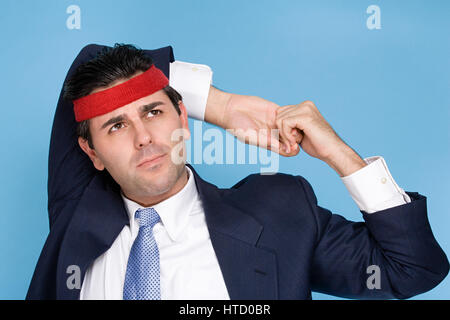 Businessman wearing a sweatband Stock Photo