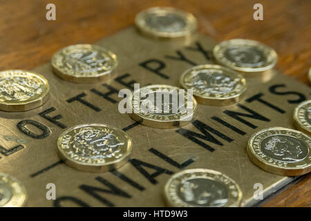 London, UK. 9th Mar, 2017. New £1 coins tested in the London Assay office ahead of their release 28th March, 2017. Pictured: In the Assay office, new £1 coins on the Pyx box, awaiting their trial. The Coins are the Realm are tested by diameter, weight and composition. Credit: Guy Corbishley/Alamy Live News Stock Photo