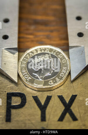 London, UK. 9th Mar, 2017. New £1 coins tested in the London Assay office ahead of their release 28th March, 2017. Pictured: In the Assay office, new £1 coins on the Pyx box, awaiting their trial. The Coins are the Realm are tested by diameter, weight and composition. Credit: Guy Corbishley/Alamy Live News Stock Photo