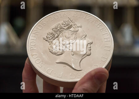 London, UK. 9th Mar, 2017. As well as standard 20p, 50p, £1, and £2 coins, the London Assay office also tests commemorative coins. Pictured here a Silver Proof Kilo Coin with a retail value over £2,000 Credit: Guy Corbishley/Alamy Live News Stock Photo