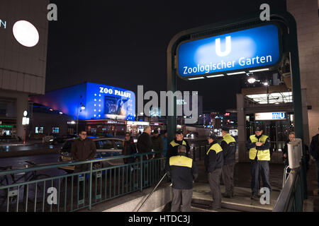 Berlin, Germany. 09th Mar, 2017. Security personnel at the entrance to the U2 underground metro Zoologischer Garten in Berlin, Germany, 09 March 2017. A suspicious package on the Berlin underground line 2 at Zoo station triggered a police operation. The platform was cleared and the train stopped. Photo: Jörg Carstensen/dpa/Alamy Live News Stock Photo