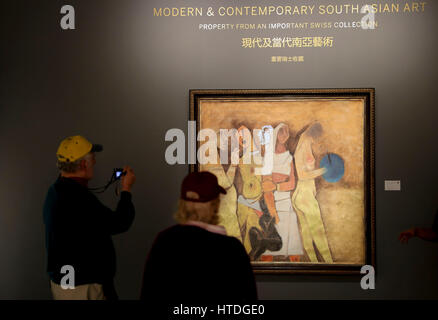 New York, USA. 10th Mar, 2017. Visitors look at 'Untitled (Four Women)' by Maqbool Fida Husain during Sotheby's Asia Week exhibition in New York, the United States, on March 10, 2017. With over 1,200 lots of Asian artworks, Sotheby's unveiled its Asia Week New York Auctions and Exhibitions recently and will hold several auctions in March. Credit: Wang Ying/Xinhua/Alamy Live News Stock Photo