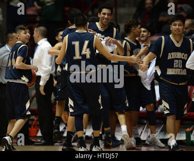 Albuquerque, NEW MEXICO, USA. 8th Mar, 2017. JOURNAL.Atrisco Heritage Academy players celebrate after defeating Onate in the 6A Boys State Basketball game played at the Pit. Photographed on Wednesday March 8, 2017. Adolphe Pierre-Louis/JOURNAL. Credit: Adolphe Pierre-Louis/Albuquerque Journal/ZUMA Wire/Alamy Live News Stock Photo