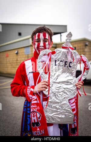Lincoln, UK. 11th Mar, 2017. #Impvasion has begun Thousands of non-league Lincoln city fans making their way to the Emirates ground to take on Arsenal in the sixth round of the FA Cup. Credit: Ian Francis/Alamy Live News