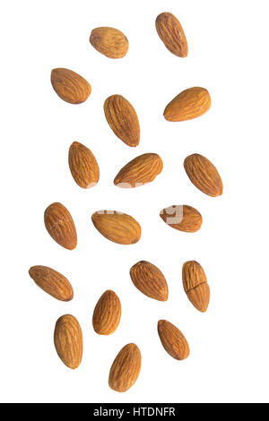Falling almonds on white background. Stock Photo