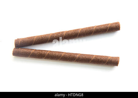 wafer rolls with chocolate isolated on white background. Stock Photo