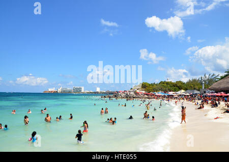 local people on beach cancun mexico Stock Photo