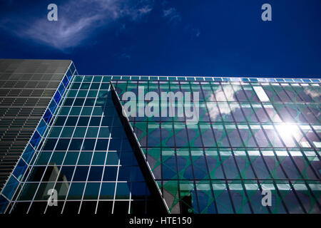 A modernist building reflects the sun in Dublin Stock Photo