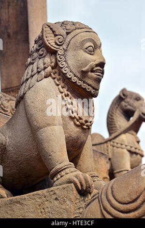Buddhist stone statues in Bhaktapur at the entrance of a temple, Nepal Stock Photo