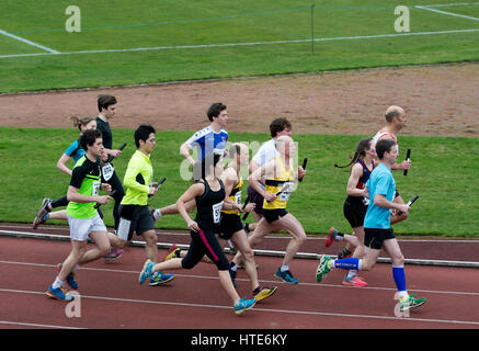 Runners at Iffley Road track at the start of the Teddy Hall Relays, Oxford, UK Stock Photo