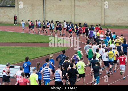 Runners at Iffley Road track at the start of the Teddy Hall Relays, Oxford, UK Stock Photo