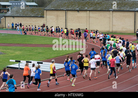 Runners at Iffley Road track at the start of the Teddy Hall Relays, Oxford, UK Stock Photo