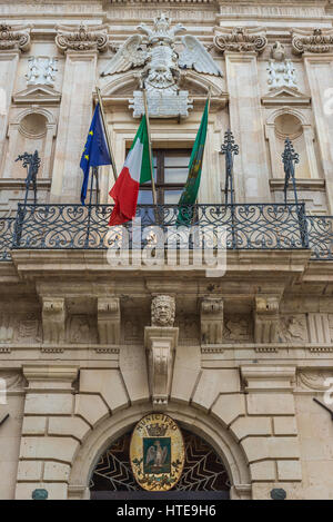 Coat of arms at Vermexio Palace, current Town Hall at Cathedral Square (Piazza del Duomo) on Ortygia island, Syracuse city, Sicily, Italy Stock Photo