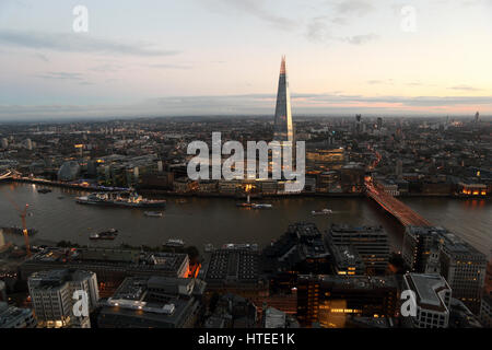 Rooftop POV of the Shard, City Hall and London Bridge Station, The Thames and HNS Belfast, photographed from the Sky Garden.