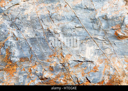 rocks stone and red orange gneiss in the wall of morocco Stock Photo