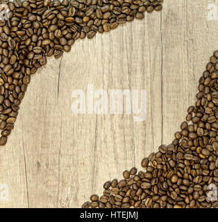 Coffee beans on wooden table, frame coffee beans Stock Photo
