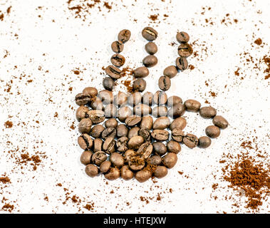 Coffee cup with smoke right side frame made from coffee bean on white Stock Photo