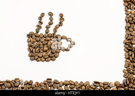 Coffee cup with smoke right side frame made from coffee bean on white Stock Photo