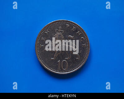 10 pence coin money (GBP), currency of United Kingdom over blue background Stock Photo